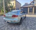 Зелений Мазда 3, об'ємом двигуна 1.6 л та пробігом 300 тис. км за 3900 $, фото 6 на Automoto.ua