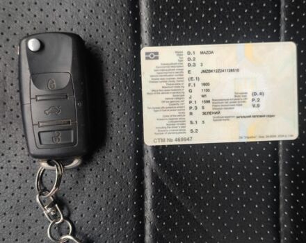Зеленый Мазда 3, объемом двигателя 1.6 л и пробегом 253 тыс. км за 3550 $, фото 5 на Automoto.ua