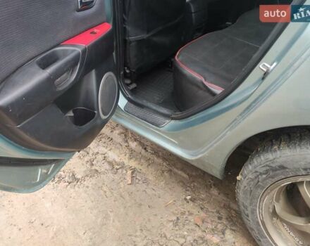 Зеленый Мазда 3, объемом двигателя 1.6 л и пробегом 253 тыс. км за 3550 $, фото 12 на Automoto.ua