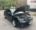 Зеленый Мазда 3, объемом двигателя 2 л и пробегом 176 тыс. км за 5700 $, фото 10 на Automoto.ua