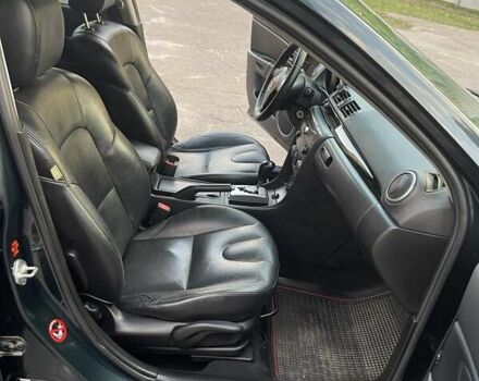 Зеленый Мазда 3, объемом двигателя 1.6 л и пробегом 155 тыс. км за 6099 $, фото 12 на Automoto.ua