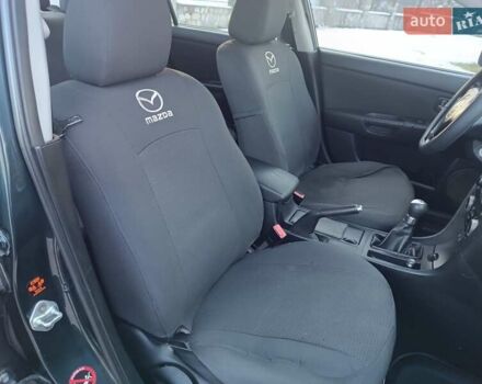 Зелений Мазда 3, об'ємом двигуна 1.6 л та пробігом 254 тис. км за 4200 $, фото 9 на Automoto.ua