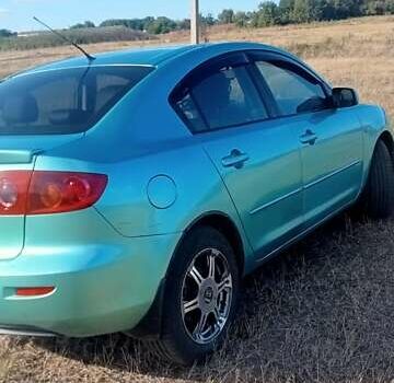 Зеленый Мазда 3, объемом двигателя 1.6 л и пробегом 203 тыс. км за 4800 $, фото 3 на Automoto.ua