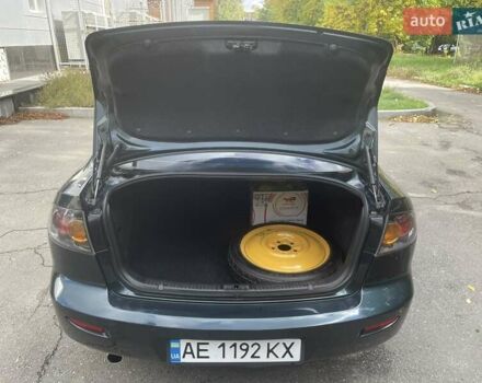 Зеленый Мазда 3, объемом двигателя 2 л и пробегом 176 тыс. км за 5700 $, фото 15 на Automoto.ua