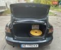 Зеленый Мазда 3, объемом двигателя 2 л и пробегом 176 тыс. км за 5700 $, фото 15 на Automoto.ua