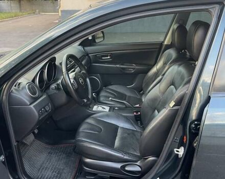 Зеленый Мазда 3, объемом двигателя 1.6 л и пробегом 155 тыс. км за 6099 $, фото 7 на Automoto.ua