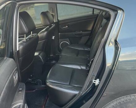 Зеленый Мазда 3, объемом двигателя 1.6 л и пробегом 155 тыс. км за 6099 $, фото 10 на Automoto.ua