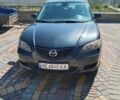Зеленый Мазда 3, объемом двигателя 2 л и пробегом 249 тыс. км за 3800 $, фото 1 на Automoto.ua