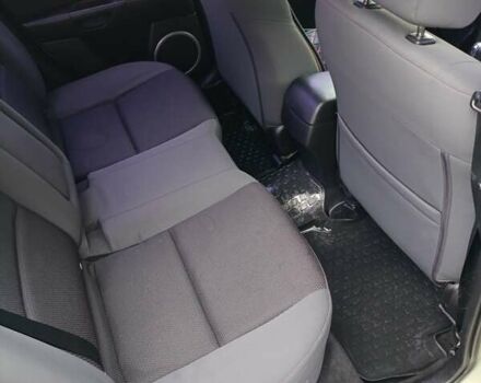 Зеленый Мазда 3, объемом двигателя 1.6 л и пробегом 230 тыс. км за 5700 $, фото 6 на Automoto.ua