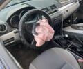 Зеленый Мазда 3, объемом двигателя 1.6 л и пробегом 178 тыс. км за 999 $, фото 2 на Automoto.ua