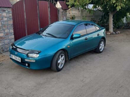 Зелений Мазда 3, об'ємом двигуна 1.8 л та пробігом 257 тис. км за 3100 $, фото 1 на Automoto.ua