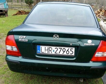 Зелений Мазда 3, об'ємом двигуна 2 л та пробігом 412 тис. км за 750 $, фото 1 на Automoto.ua