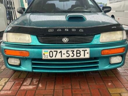 Зеленый Мазда 3, объемом двигателя 2 л и пробегом 2 тыс. км за 4000 $, фото 1 на Automoto.ua