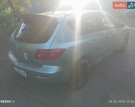 Зеленый Мазда 3, объемом двигателя 2 л и пробегом 308 тыс. км за 1550 $, фото 1 на Automoto.ua