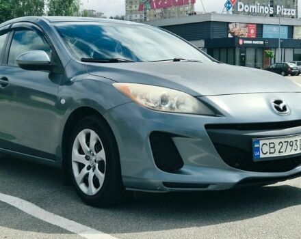 Зеленый Мазда 3, объемом двигателя 2 л и пробегом 275 тыс. км за 6600 $, фото 1 на Automoto.ua