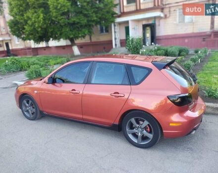 Оранжевый Мазда 3, объемом двигателя 1.6 л и пробегом 253 тыс. км за 5700 $, фото 6 на Automoto.ua