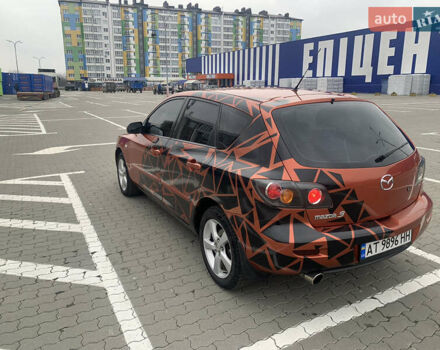 Оранжевый Мазда 3, объемом двигателя 1.6 л и пробегом 235 тыс. км за 3200 $, фото 2 на Automoto.ua