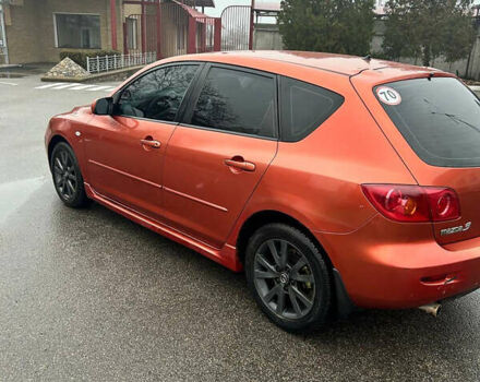 Помаранчевий Мазда 3, об'ємом двигуна 1.6 л та пробігом 198 тис. км за 4400 $, фото 2 на Automoto.ua