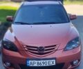 Оранжевый Мазда 3, объемом двигателя 1.6 л и пробегом 253 тыс. км за 5700 $, фото 4 на Automoto.ua