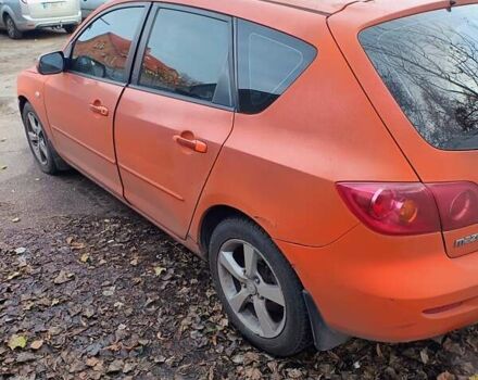 Оранжевый Мазда 3, объемом двигателя 1.6 л и пробегом 351 тыс. км за 3800 $, фото 4 на Automoto.ua
