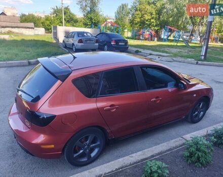 Оранжевый Мазда 3, объемом двигателя 1.6 л и пробегом 253 тыс. км за 5700 $, фото 2 на Automoto.ua