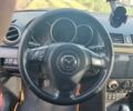 Оранжевый Мазда 3, объемом двигателя 1.6 л и пробегом 150 тыс. км за 4500 $, фото 3 на Automoto.ua