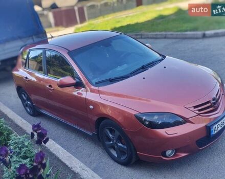 Оранжевый Мазда 3, объемом двигателя 1.6 л и пробегом 253 тыс. км за 5700 $, фото 7 на Automoto.ua