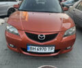Оранжевый Мазда 3, объемом двигателя 1.6 л и пробегом 265 тыс. км за 4800 $, фото 1 на Automoto.ua