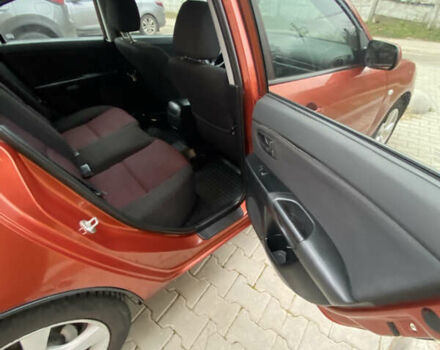 Оранжевый Мазда 3, объемом двигателя 1.6 л и пробегом 260 тыс. км за 4500 $, фото 5 на Automoto.ua