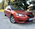 Оранжевый Мазда 3, объемом двигателя 1.6 л и пробегом 275 тыс. км за 4899 $, фото 1 на Automoto.ua