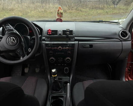 Оранжевый Мазда 3, объемом двигателя 1.6 л и пробегом 260 тыс. км за 4500 $, фото 4 на Automoto.ua