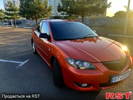 Помаранчевий Мазда 3, об'ємом двигуна 1.6 л та пробігом 211 тис. км за 5700 $, фото 1 на Automoto.ua