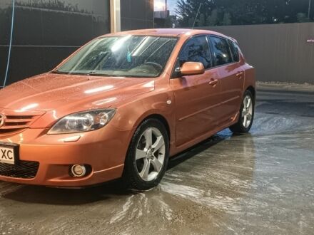 Оранжевый Мазда 3, объемом двигателя 2 л и пробегом 230 тыс. км за 3800 $, фото 1 на Automoto.ua