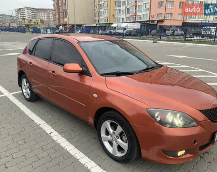 Оранжевый Мазда 3, объемом двигателя 1.6 л и пробегом 235 тыс. км за 3200 $, фото 1 на Automoto.ua
