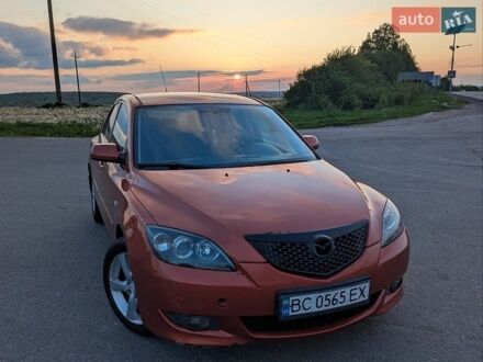 Оранжевый Мазда 3, объемом двигателя 1.6 л и пробегом 329 тыс. км за 3900 $, фото 1 на Automoto.ua