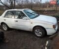 Белый Мазда 323, объемом двигателя 1.5 л и пробегом 100 тыс. км за 558 $, фото 1 на Automoto.ua