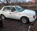 Белый Мазда 323, объемом двигателя 1.5 л и пробегом 100 тыс. км за 557 $, фото 1 на Automoto.ua