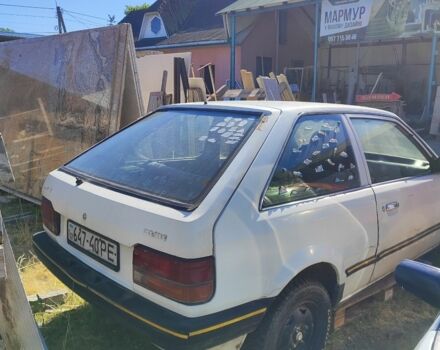 Белый Мазда 323, объемом двигателя 1.7 л и пробегом 500 тыс. км за 214 $, фото 3 на Automoto.ua