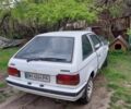 Белый Мазда 323, объемом двигателя 1.5 л и пробегом 350 тыс. км за 502 $, фото 4 на Automoto.ua