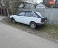 Белый Мазда 323, объемом двигателя 1.3 л и пробегом 100 тыс. км за 600 $, фото 1 на Automoto.ua