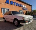 Белый Мазда 323, объемом двигателя 1.7 л и пробегом 250 тыс. км за 1200 $, фото 1 на Automoto.ua