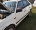 Белый Мазда 323, объемом двигателя 1.5 л и пробегом 270 тыс. км за 700 $, фото 1 на Automoto.ua