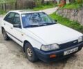 Белый Мазда 323, объемом двигателя 1.5 л и пробегом 245 тыс. км за 899 $, фото 1 на Automoto.ua