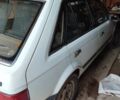 Белый Мазда 323, объемом двигателя 1.5 л и пробегом 270 тыс. км за 700 $, фото 3 на Automoto.ua