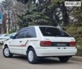 Білий Мазда 323, об'ємом двигуна 1.6 л та пробігом 240 тис. км за 2999 $, фото 6 на Automoto.ua