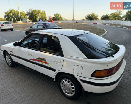 Білий Мазда 323, об'ємом двигуна 0 л та пробігом 191 тис. км за 1950 $, фото 5 на Automoto.ua
