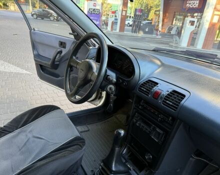 Білий Мазда 323, об'ємом двигуна 1.6 л та пробігом 193 тис. км за 1950 $, фото 9 на Automoto.ua