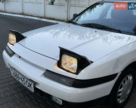 Білий Мазда 323, об'ємом двигуна 0 л та пробігом 191 тис. км за 1950 $, фото 2 на Automoto.ua