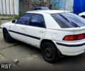Белый Мазда 323, объемом двигателя 1.8 л и пробегом 150 тыс. км за 700 $, фото 3 на Automoto.ua