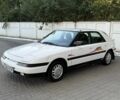 Білий Мазда 323, об'ємом двигуна 1.6 л та пробігом 193 тис. км за 1950 $, фото 1 на Automoto.ua